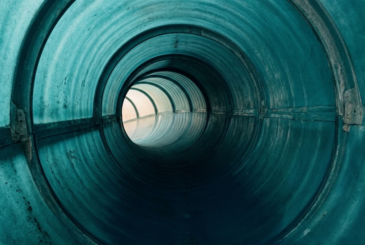 Empty interior view of a fiberglass water slide tube